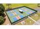 Aerial view of fenced pickleball courts with shelters providing an active recreational space at 6741 Heavitree Dr, Sebring, FL 33876