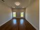Spacious room with two windows and ample lighting at 6741 Heavitree Dr, Sebring, FL 33876