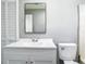 Bathroom with a vanity and toilet at 8228 Shriver Dr, Orlando, FL 32822