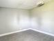 Neutral bedroom with plank flooring at 8228 Shriver Dr, Orlando, FL 32822