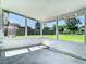Enclosed patio with concrete floors and views of the backyard at 8228 Shriver Dr, Orlando, FL 32822