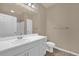 Neutral bathroom with long vanity, large mirror, and tub and shower combo at 860 N Orange Ave # 306, Orlando, FL 32801