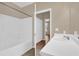 Bathroom featuring a white tub/shower combo with a white vanity and sink at 860 N Orange Ave # 306, Orlando, FL 32801