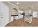 Clean kitchen with black appliances, white cabinets, lots of counter space, and durable wooden floors at 860 N Orange Ave # 306, Orlando, FL 32801