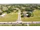 Expansive aerial view of a community with a green landscape and well-maintained streets and surrounding area at 8600 Castile Rd, Sebring, FL 33876