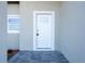 A close up shot of the front door with a keypad entry system at 8600 Castile Rd, Sebring, FL 33876