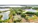 Scenic aerial view showcasing the community's serene ponds, lush landscaping, tennis courts, and inviting atmosphere at 8801 Latrec Ave # 8101, Orlando, FL 32819