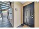 The entrance to the unit. The door is solid and black with a gold handle. The unit number '101' is displayed at 8801 Latrec Ave # 8101, Orlando, FL 32819