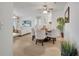 Inviting living and dining area featuring a ceiling fan and contemporary decor at 8801 Latrec Ave # 8101, Orlando, FL 32819