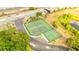Aerial view of tennis and basketball courts, offering recreational amenities for residents and an active lifestyle at 8801 Latrec Ave # 8101, Orlando, FL 32819