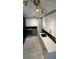 Modern laundry room with white cabinetry, sleek countertops, and stainless steel washer and dryer at 954 N Texas Ave, Orlando, FL 32804