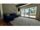 Bright living room with large sliding glass doors and view of the backyard swimming pool at 954 N Texas Ave, Orlando, FL 32804