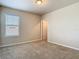 Bedroom with neutral carpet, walls and natural light through window at 9971 Beach Port Dr, Winter Garden, FL 34787