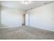 Spacious bonus room featuring neutral paint, plush carpet, and easy access to multiple other rooms at 9971 Beach Port Dr, Winter Garden, FL 34787
