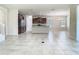 An open concept kitchen features stainless steel appliances and brown cabinets at 9971 Beach Port Dr, Winter Garden, FL 34787