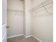 Empty walk-in closet with installed wire shelving ready for personalized storage solutions at 9971 Beach Port Dr, Winter Garden, FL 34787