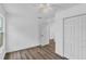Bedroom with wood-look floors leads to closets and the rest of the home at 1050 20 St, Orlando, FL 32805