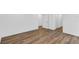 Spacious bedroom features wood-look flooring that leads to the hallway and closet at 1050 20 St, Orlando, FL 32805