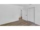 Bedroom showcasing the closet doors and vinyl floor at 1050 20 St, Orlando, FL 32805