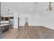Bright living area with hardwood floors, ample natural light, and open floor plan at 1050 20 St, Orlando, FL 32805