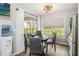 Breakfast nook features sliding glass doors to the lanai and view of the backyard at 1111 High Vista Dr, Davenport, FL 33837