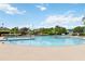 Large, bright community pool with clear blue water and ample space for swimming and relaxation at 1111 High Vista Dr, Davenport, FL 33837