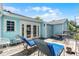 Entertain or relax on the spacious deck with double doors that lead into the house at 1225 W Smith St, Orlando, FL 32804
