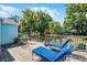 Relax on the back deck with charming furniture and views of the lovely backyard at 1225 W Smith St, Orlando, FL 32804