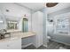 Inviting bathroom featuring a vanity, mirror, and tiled floor at 1225 W Smith St, Orlando, FL 32804