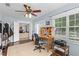 Functional office space with a desk, shelving, and natural light at 1225 W Smith St, Orlando, FL 32804