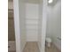 Bathroom featuring walk-in shower, toilet, and additional closet at 12845 Sawgrass Pine Cir, Orlando, FL 32824