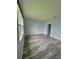 Bright bedroom with new flooring and fresh paint at 12845 Sawgrass Pine Cir, Orlando, FL 32824