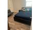 Bedroom features modern furnishings and ample natural light at 12845 Sawgrass Pine Cir, Orlando, FL 32824