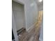 Walk-in closet featuring built-in shelving and durable flooring at 12845 Sawgrass Pine Cir, Orlando, FL 32824