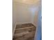 Walk-in closet featuring built-in shelving and durable flooring at 12845 Sawgrass Pine Cir, Orlando, FL 32824