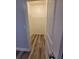 Walk-in closet with rod for hanging clothes, and a continuation of the floors at 12845 Sawgrass Pine Cir, Orlando, FL 32824