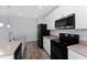 Modern kitchen featuring stainless steel appliances and a stylish faucet and sink at 12845 Sawgrass Pine Cir, Orlando, FL 32824