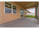 The screened lanai features a concrete patio that provides a cozy outdoor space for entertainment and relaxation at 12845 Sawgrass Pine Cir, Orlando, FL 32824