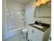 Clean and bright bathroom featuring a shower-tub combo and updated vanity at 1326 Edmundshire Ln, Orlando, FL 32806