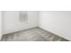 A naturally illuminated bedroom with carpet and base trim at 1396 Mirabella Cir, Davenport, FL 33897