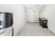 Spacious two-car garage with storage area and a new door at 1396 Mirabella Cir, Davenport, FL 33897