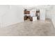 Bright kitchen features stainless steel appliances, granite countertops, and central island with sink at 1396 Mirabella Cir, Davenport, FL 33897