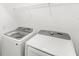 Laundry room with newer model Samsung washer and dryer at 1396 Mirabella Cir, Davenport, FL 33897