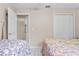Shared bedroom with two beds and a closet at 14 Sequoia Way, Kissimmee, FL 34758