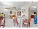 Open dining area with tile flooring and abundant natural light, blending classic charm at 14 Sequoia Way, Kissimmee, FL 34758