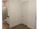 Bathroom with tile shower and grey-toned flooring at 14955 Lebeau Loop, Winter Garden, FL 34787