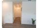 Hallway with grey-toned flooring and white walls at 14955 Lebeau Loop, Winter Garden, FL 34787