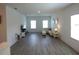 Spacious living room with two windows at 14955 Lebeau Loop, Winter Garden, FL 34787