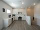 Office space with desk and overhead cabinets at 14955 Lebeau Loop, Winter Garden, FL 34787
