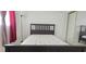 The bright bedroom has a closet, natural light, and neutral colors at 1504 Virginia Ave # 105, Daytona Beach, FL 32114